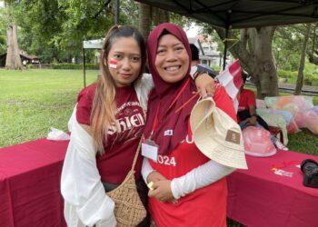 移工朋友貼上印尼國旗，開心參與屬於他們的節日