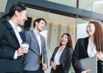 group-smart-young-asian-businessmale-female-formal-dress-walking-pass-modern-office-entrance-with-confident-happiness_609648-1609