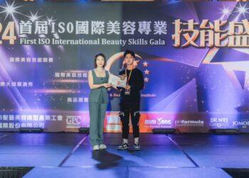 創意編梳冠軍陳力宏(右)